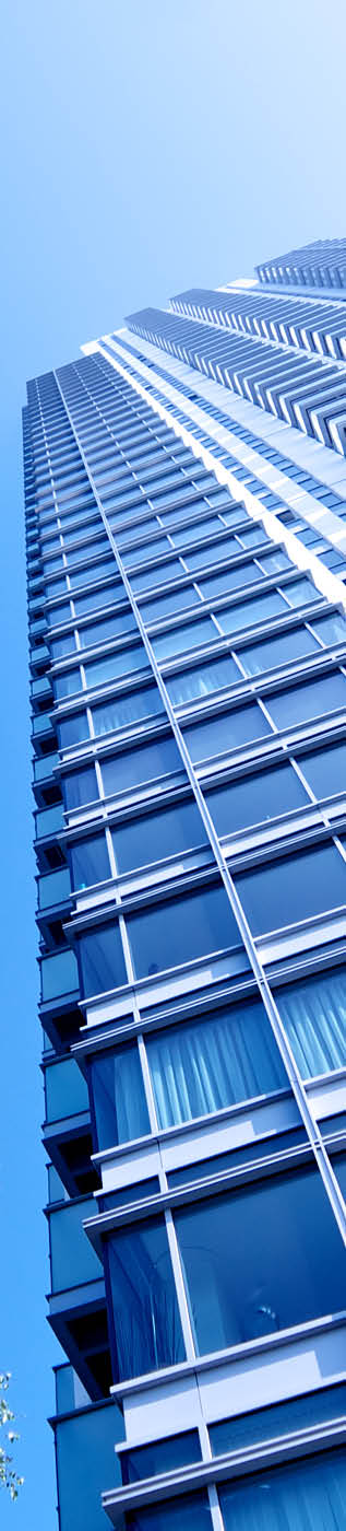 Residential Skyscrapers with diminishing perspective, Trees and clear sky backdrop